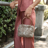 Bolso de invitada estampado | Dorado