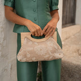 Clutch bag with embroidered flowers