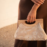Clutch bag with embroidered flowers